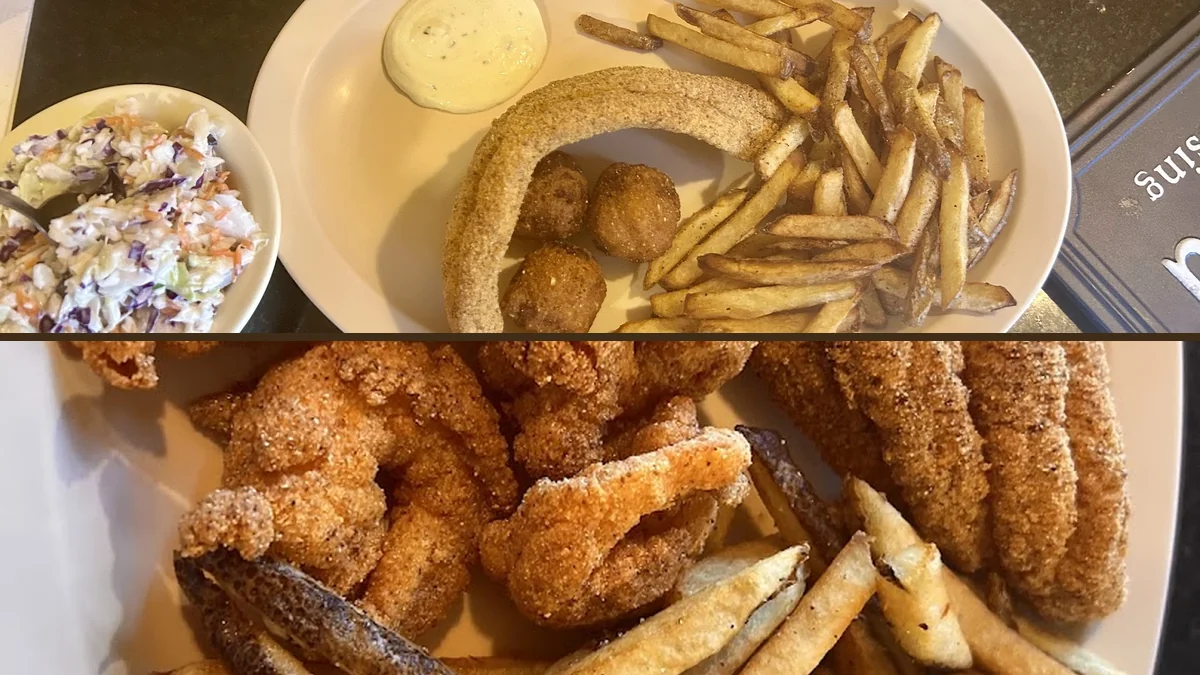 Crispy shrimp beside coleslaw and sides.